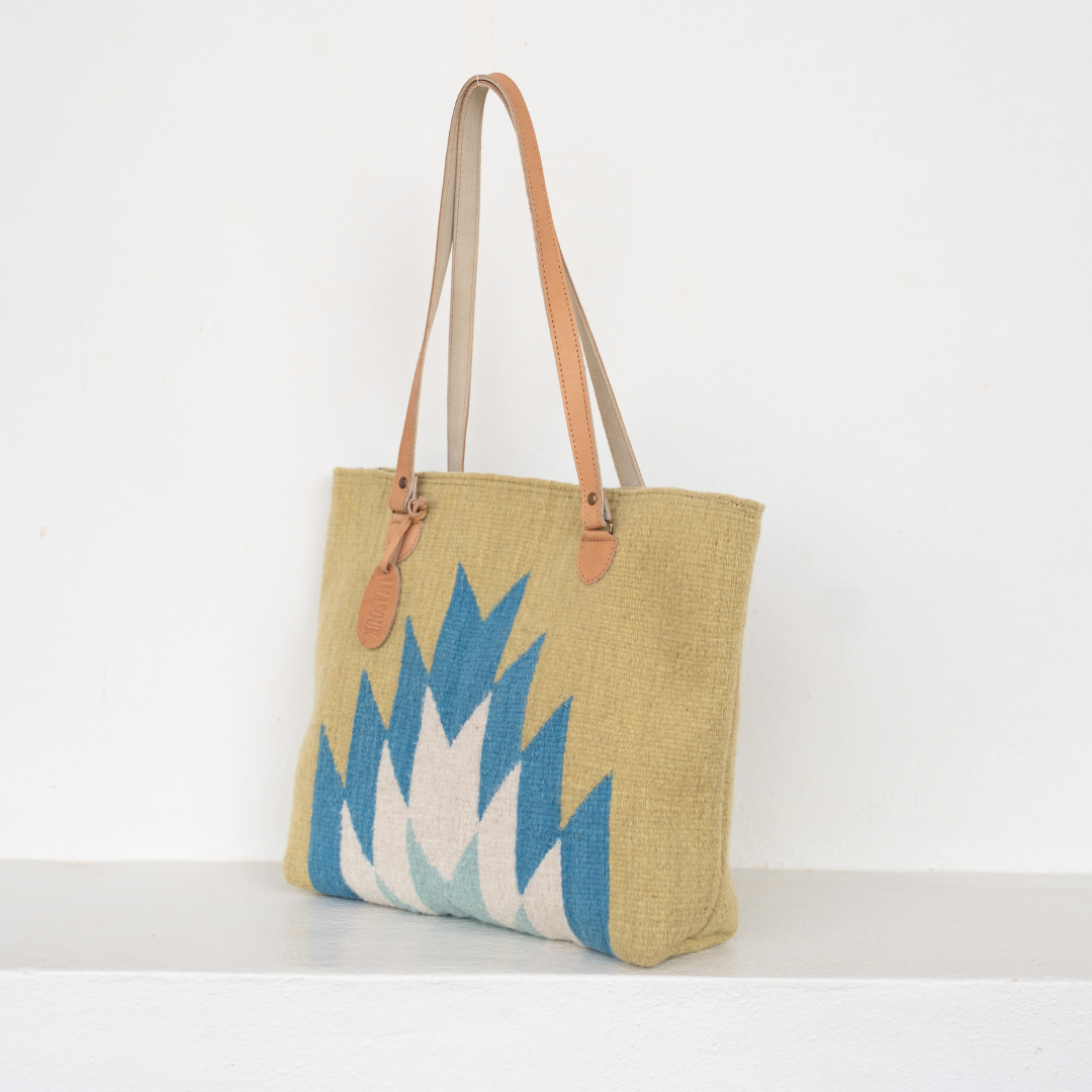 Zapotec handwoven tote bag with blue and green lightning design, leather straps, and interior pocket; spacious and stylish for everyday use