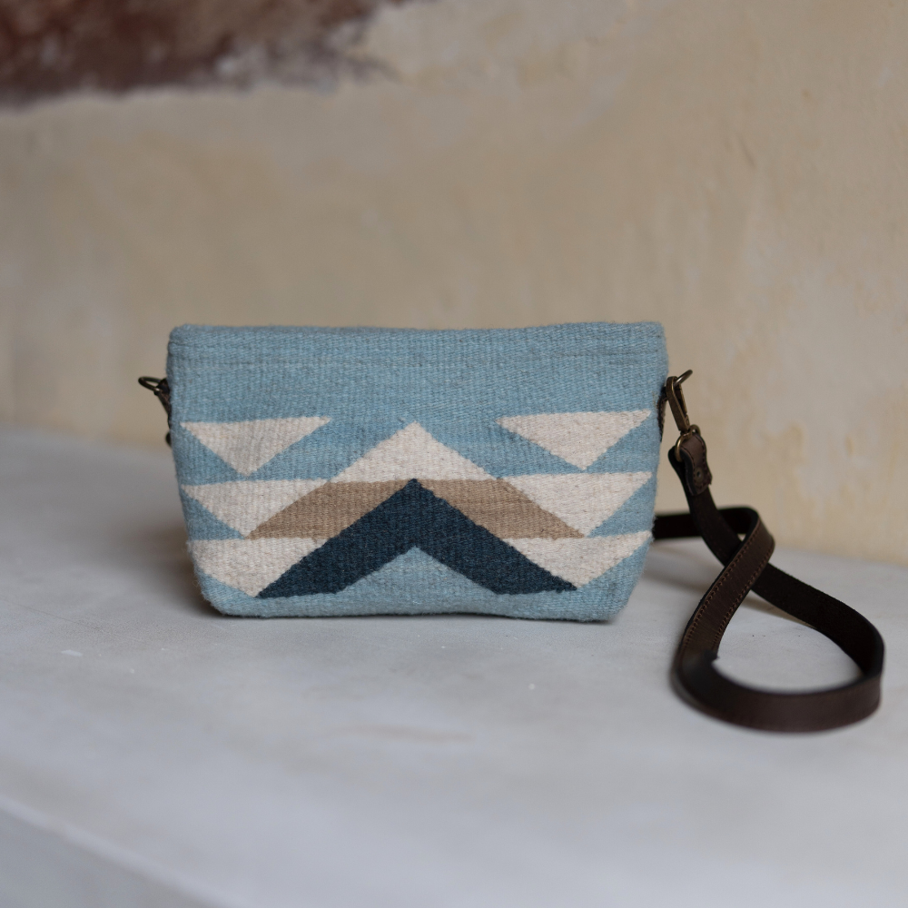 AMASOUK handwoven wool Reflejos convertible clutch/wristlet/crossbody bag, featuring a Zapotec pattern in stunning shades of blue. A versatile 3-in-1 accessory for any occasion.