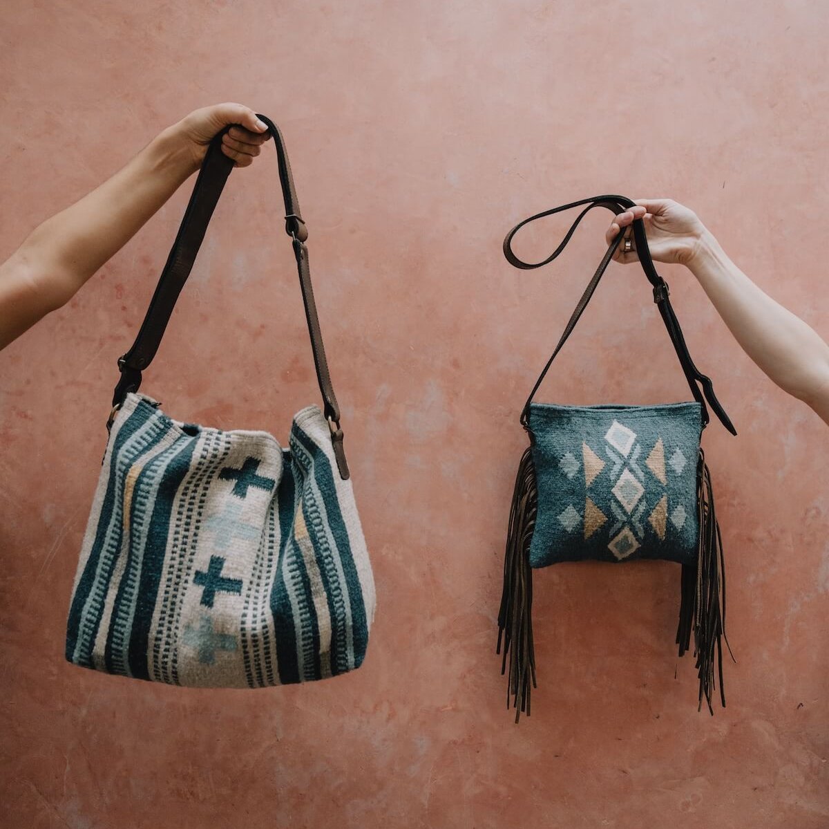 Elegant AMASOUK Copalita handwoven wool and leather convertible shoulder/crossbody bag in blue, cream, honey, and gray. The perfect blend of functionality and fashion.