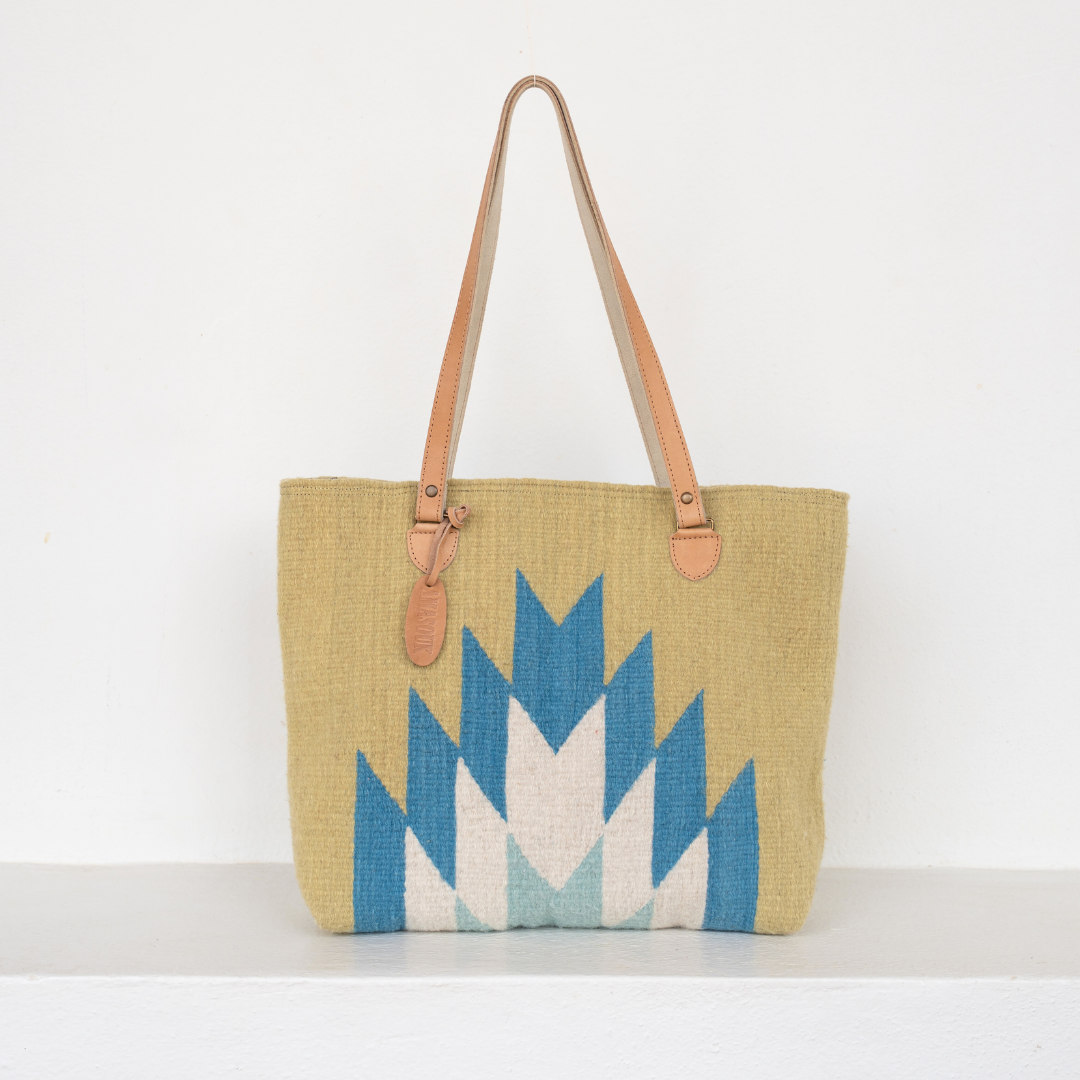 Zapotec handwoven tote bag with blue and green lightning design, leather straps, and interior pocket; spacious and stylish for everyday use