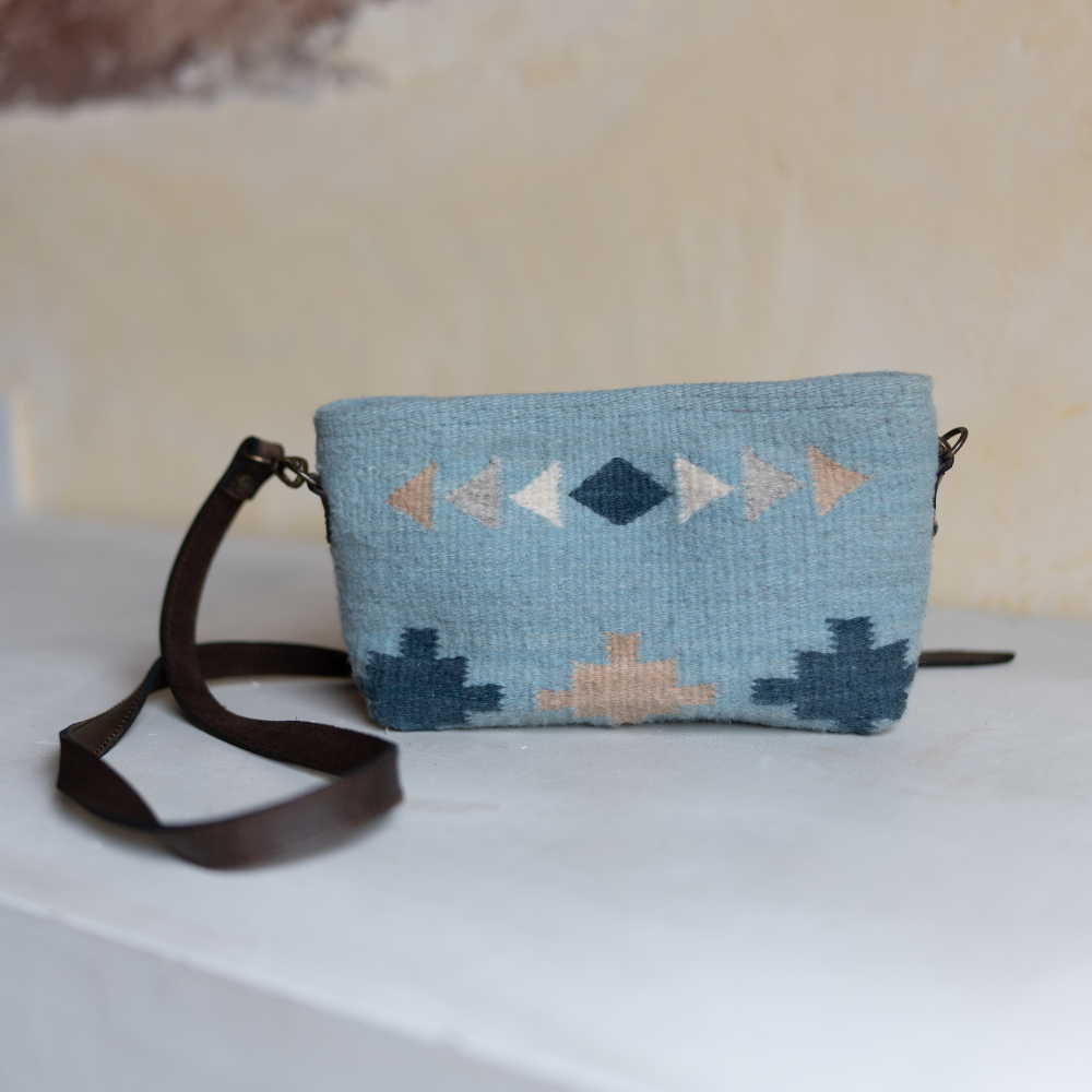 AMASOUK handwoven wool Cielito Convertible Clutch/Wristlet/Crossbody Bag, featuring a Zapotec pattern in elegant shades of blue. A versatile 3-in-1 bag for any occasion.