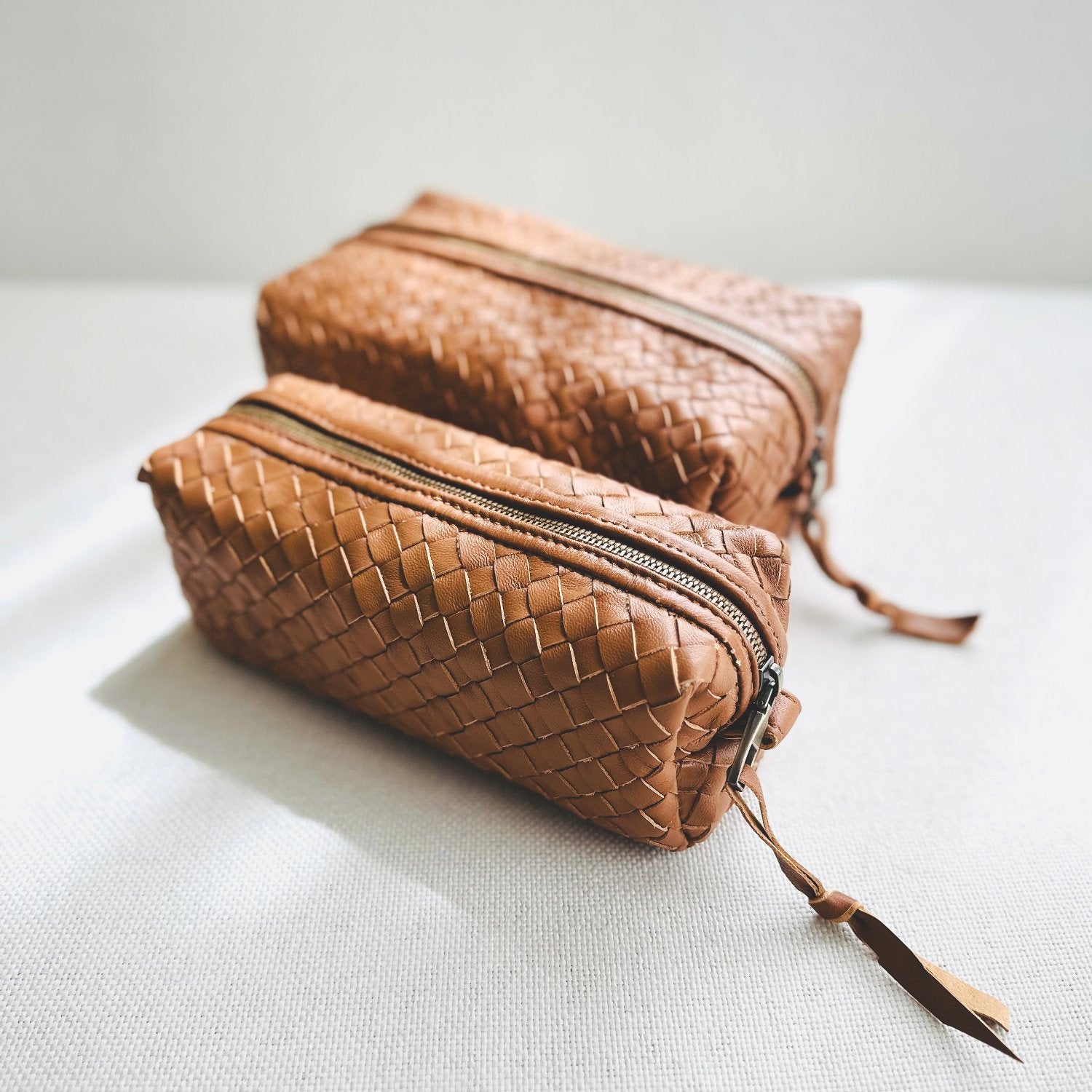 Woven Leather Makeup Bag by AMASOUK