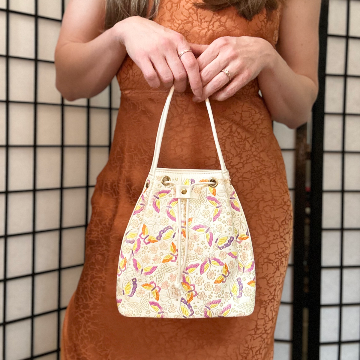 White Leather Bucket Bag with Butterfly Design